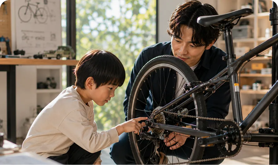 家庭教師と自転車の仕組みを調べながら工学・機械を学ぶ子ども